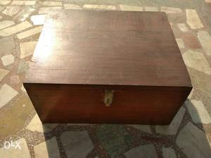 Wooden box with multiple space and extra rods