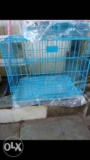 Animal cage 2.5ft unused with food trays. price