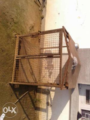 Brown And Black Steel Animal Cage