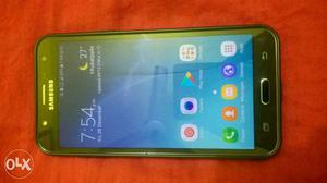 Samsung galaxy j with box. used 1 year. No scratches