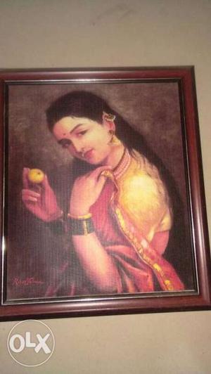 Black Haired Woman Holding A Round Yellow Fruit Portrait