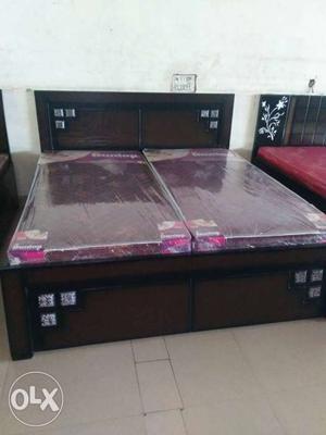 Brown Wooden Framed Bed Without Two Red Mattress