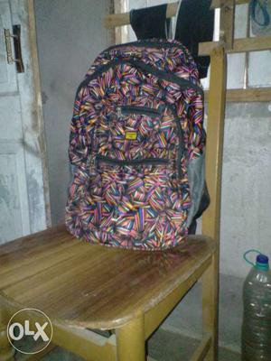 Pink, Purple And Black Backpack