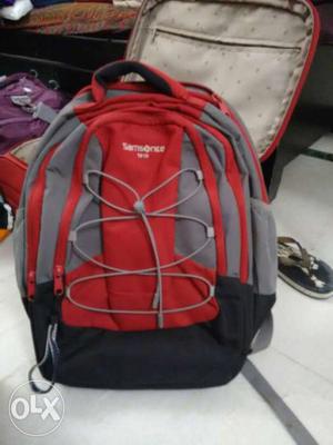 Red, Gray, And Black Samsonite Backpack