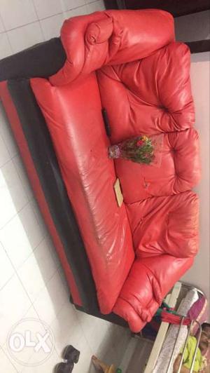 Red colour sofa with good condition..
