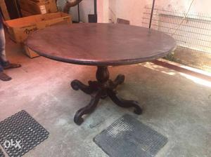 Round Brown Wooden Pedestal Table