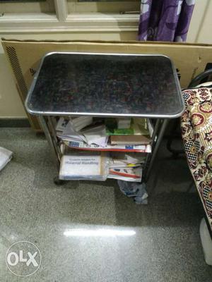 Tv table medium size. With movable wheels and