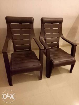 Two Black Plastic Chairs