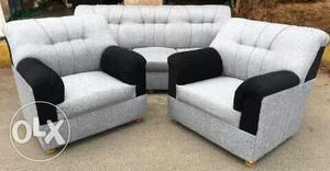 Two White And Black Sofa Chairs With Sofa