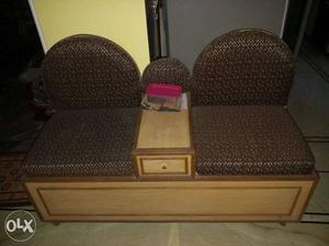 A 2 seater settee with storage and drawer.. ideal