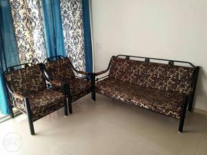 Two Black And Brown Floral Sofa