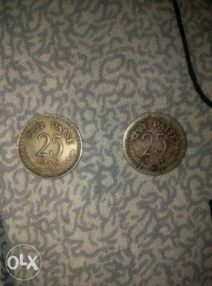 25 paise coins of  and 