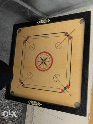 Brown And Black Pocket Carrom Board