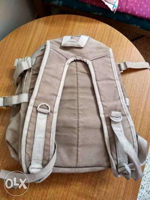 Brown And White Backpack