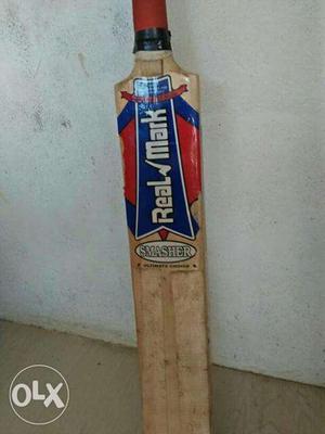 Brown, Blue, And Red Real Mark Cricket Bat