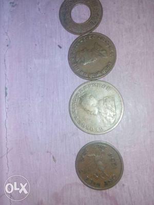 Four Round Gray Coins