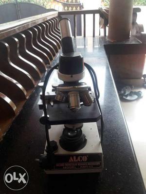 Gray And Black Alco Microscope