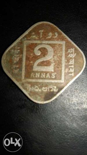 It's a 2 anna coin of the time of reign of King