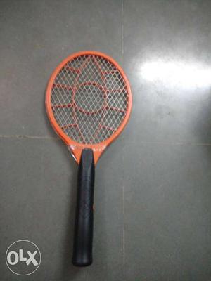 Orange And Black Racket