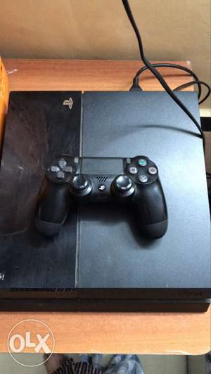 PS4 with controller in excellent condition