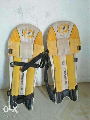 Pair Of White-and-yellow Campus Knee Guards