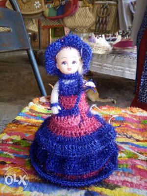 Porcelain Doll With Blue Knitted Dress