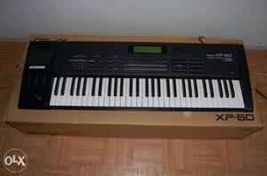 Roland xp 60 with brand new condition with adapter