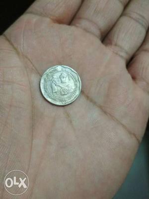 Round Silver-colored Coin
