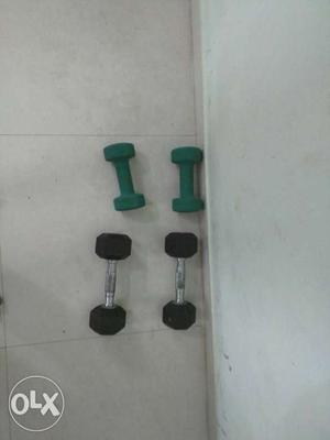 Two 4 kg and one pair of 3kg dumbell