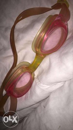 Yellow And Pink Swimming Goggles