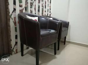 2 leather single seater sofa chair. Negotiable. At home