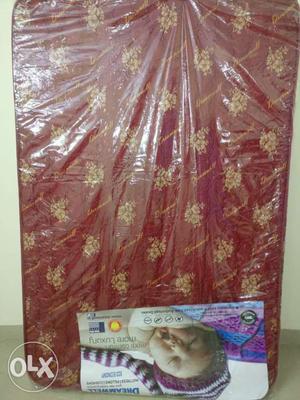 Brand new mattress(without cot) Size: 6*4.Material Coir+Foam