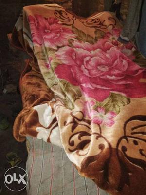 Brown And Pink Floral Textile