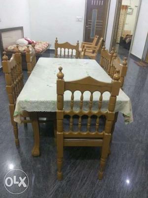 Brown table with 6 chairs