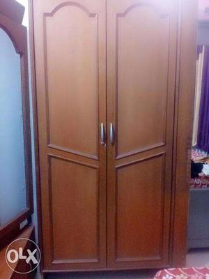 Good quality wood.Brown color wardrobe.Lots of