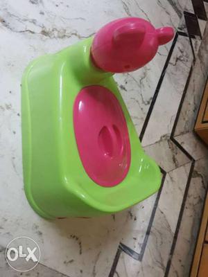 Green And Pink Plastic Container