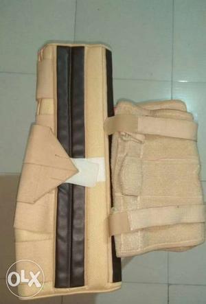 Knee brace and elastic knee support