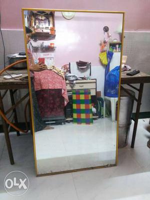 Rectangular Shaped Mirror With Brown Frame