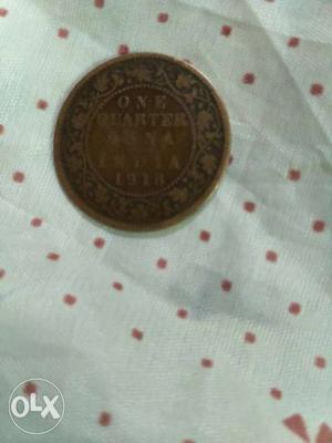 Round Copper-colored One Quarter Anna Indian Coin