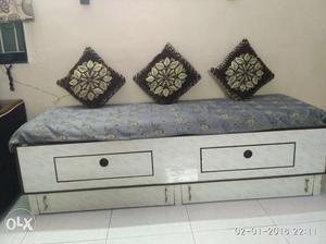 Single cot along with matress. Two cabinets