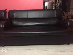 Sofa set with wooden hand rest. 1 year old good