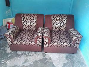 Two Brown-and-black Floral Sofa Chairs