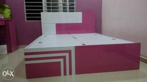 White And Pink Wooden Bed Fram