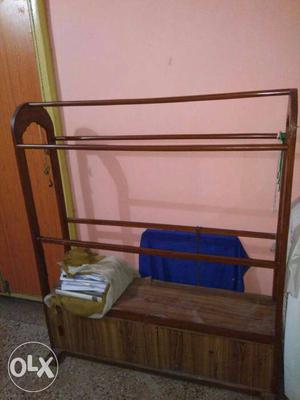 Wooden stand for clothes