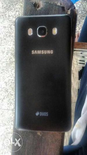 Samsung Galaxy J5, with 2 back pouches, headset,