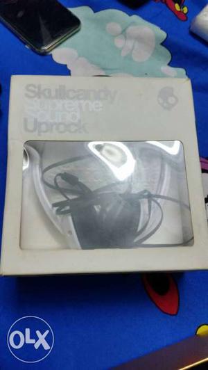 Black And Silver Skullcandy Headphones In Box