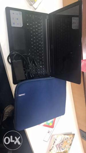 Black Laptop Computer With Blue