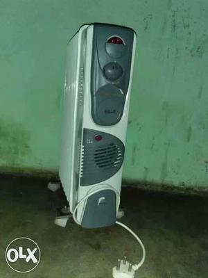Gray And White Oil Heater