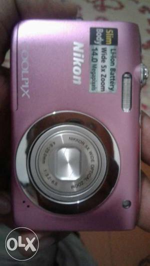 Pink And Silver Nikon Coolpix Digital Camera