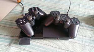 Sony PS2 with 2 controllers and games
